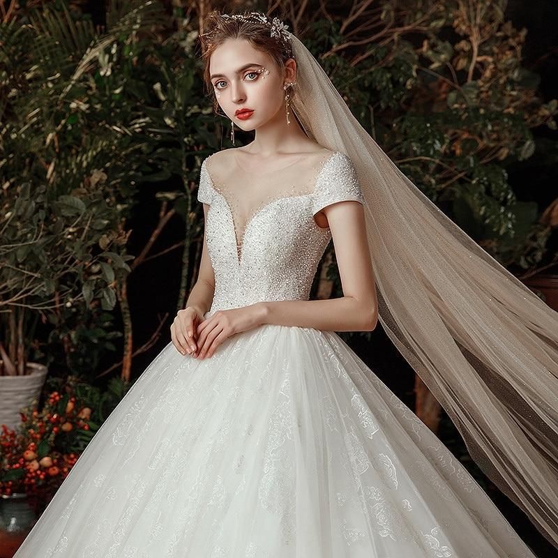 Luxury Wedding Dress With Sparkling Shiny Crystal Beads | EdleessFashion Luxury Wedding Dress With Sparkling Shiny Crystal Beads | EdleessFashion